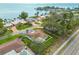 Beautiful aerial view of the home highlighting its prime waterfront location, lush greenery, and neighborhood at 6655 Colony S Dr, St Petersburg, FL 33705