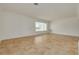 Bright living room featuring tile flooring, neutral walls, and natural light at 6655 Colony S Dr, St Petersburg, FL 33705