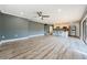 Bright living room features hard surface floors that flow into the adjacent kitchen with bar seating at 722 116Th Ave N # 2002, St Petersburg, FL 33716