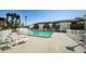 Community pool and surrounding condos with well-maintained landscaping at 722 116Th Ave N # 2002, St Petersburg, FL 33716