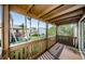 View of a condo porch overlooking tropical landscaping including palm trees and other greenery at 722 116Th Ave N # 2002, St Petersburg, FL 33716