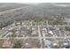 An aerial view of the community highlighting a mix of homes and wooded areas at 8547 Horizon Ln, Hudson, FL 34667