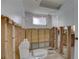 Bathroom with a toilet and shower, currently undergoing renovations at 8547 Horizon Ln, Hudson, FL 34667