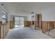 Living room with sliding glass doors opening to a pool, currently undergoing renovations at 8547 Horizon Ln, Hudson, FL 34667