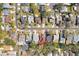 Overhead aerial view of a residential area with a home highlighted in red to indicate the property boundary at 8814 Hampden Dr, Tampa, FL 33626