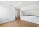 Bright room with wood-look floors and white trim showcasing the architectural details at 8814 Hampden Dr, Tampa, FL 33626