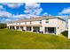 Aerial view of modern townhomes with spacious backyards at 9258 Rock Harbour Way, Tampa, FL 33637