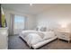 Well-lit bedroom with neutral tones, plush carpet, and ample natural light at 9258 Rock Harbour Way, Tampa, FL 33637