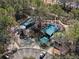 Aerial view of a community playground with covered seating and ample parking at 9510 Georgian Park Ln # 106, Tampa, FL 33626