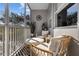 Cozy porch with seating area, plants, and plenty of natural light at 9510 Georgian Park Ln # 106, Tampa, FL 33626