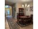 Elegant dining room showcasing an elegant chandelier, wood table, and elegant decorations at 116 Silver Falls Dr, Apollo Beach, FL 33572