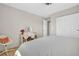 Light-filled bedroom featuring neutral walls and a vanity area at 1227 Queen Anne Dr # C, Palm Harbor, FL 34684