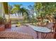 Charming backyard features a wooden deck, a peaceful garden, and verdant landscaping for relaxing outdoor living at 123 17Th Se Ave, St Petersburg, FL 33701