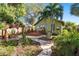 Serene backyard features a deck, gazebo, lush landscaping, offering a private and picturesque outdoor retreat at 123 17Th Se Ave, St Petersburg, FL 33701