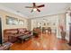 Spacious living room showcasing hardwood floors, neutral walls, fireplace and comfortable leather seating at 123 17Th Se Ave, St Petersburg, FL 33701