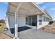 Exterior shot of home featuring an open carport, screened porch, and fresh exterior paint, providing a welcoming entrance at 1531 Council Dr, Sun City Center, FL 33573