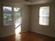 Bright bedroom with hardwood floors and large windows with natural light at 1736 14Th N St, St Petersburg, FL 33704