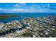 A stunning aerial view of a waterfront community with canals and beautiful houses at 1826 Nevada Ne Ave, St Petersburg, FL 33703