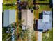 Birds eye view of single-story home, showcasing the roof, trees, and the property boundaries at 1826 Nevada Ne Ave, St Petersburg, FL 33703