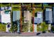 An aerial shot showcasing the roof, trees, and property boundaries of a single-story home in a neighborhood at 1826 Nevada Ne Ave, St Petersburg, FL 33703