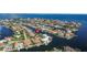 Aerial view of waterfront neighborhood featuring canal access and stunning water views at 1930 Kansas Ne Ave, St Petersburg, FL 33703