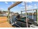 Close-up of jet ski on a lift at the private dock, showcasing waterfront lifestyle at 1930 Kansas Ne Ave, St Petersburg, FL 33703