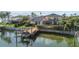 Beautiful waterfront home with a private boat dock and lift, perfect for boating enthusiasts at 1930 Kansas Ne Ave, St Petersburg, FL 33703