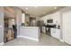 Bright kitchen with stainless steel appliances and a breakfast bar, designed for both style and functionality at 2619 Ravendale Ln, Holiday, FL 34691