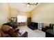 Bedroom featuring tile flooring, a ceiling fan, and abundant natural light at 3037 Crest Dr, Clearwater, FL 33759