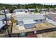 Aerial view of the home showing the roof, backyard, and surrounding neighborhood at 3246 Thorny Ridge Dr, Holiday, FL 34691