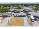 Aerial view of the home showing the roof, yard, and surrounding neighborhood at 3246 Thorny Ridge Dr, Holiday, FL 34691