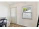 Bright bedroom with lots of natural light and wood-look laminate flooring at 4215 E Bay Dr # 900, Clearwater, FL 33764