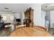 Dining area with a wooden table and chairs next to the kitchen at 4215 E Bay Dr # 900, Clearwater, FL 33764