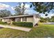 Charming home exterior with well-maintained landscaping and a welcoming entrance at 4215 E Bay Dr # 900, Clearwater, FL 33764