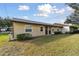 Inviting exterior view of the property, showcasing well-maintained landscaping and neutral tones at 4215 E Bay Dr # 900, Clearwater, FL 33764