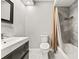 Bathroom with a modern vanity, toilet, and tiled shower/tub combination at 4620 Hidden View Pl # 10, Sarasota, FL 34235