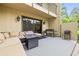 Relaxing outdoor patio featuring comfortable seating and a barbecue grill at 4620 Hidden View Pl # 10, Sarasota, FL 34235