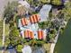 Stunning aerial view of the home showcasing lush landscaping and private waterfront access at 4811 Paradise S Way, St Petersburg, FL 33705