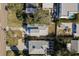 Birds-eye view of a residential home highlighting the roof, landscaping, and driveway at 512 Oceanview Ave, Palm Harbor, FL 34683