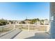 Balcony with white railing offers a view of the neighborhood at 512 Oceanview Ave, Palm Harbor, FL 34683