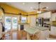 Eat in kitchen with stainless steel appliances and white cabinetry at 512 Oceanview Ave, Palm Harbor, FL 34683