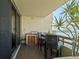 Private outdoor balcony with seating and beautiful views of the water at 5701 Mariner St # 606, Tampa, FL 33609