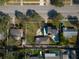 Aerial view of property showcasing the backyard pool, detached garage, and neighborhood at 6342 5Th N Ave, St Petersburg, FL 33710