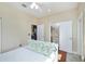 Bright bedroom with a view of a bathroom and small kitchenette area at 6342 5Th N Ave, St Petersburg, FL 33710