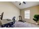 Versatile room featuring a treadmill, desk, and office chair at 7510 Red Mill Cir, New Port Richey, FL 34653