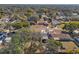 Aerial view of a residential neighborhood showcasing tree lined streets and single-Gathering homes at 8449 Valmora St, Spring Hill, FL 34608