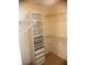 Organized walk-in closet features shelving and drawer storage at 10265 Gandy N Blvd # 1806, St Petersburg, FL 33702