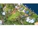 Aerial view showcases a spacious land with waterfront access, perfect for outdoor enthusiasts and nature lovers at 10501 Bridgewood Dr, Riverview, FL 33578