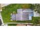 Aerial view of the home displaying a spacious backyard with a private deck, creating an outdoor oasis at 10501 Bridgewood Dr, Riverview, FL 33578