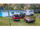 Spacious garage and workshop plus ample parking for your truck, jeep, and RV trailer at 10501 Bridgewood Dr, Riverview, FL 33578